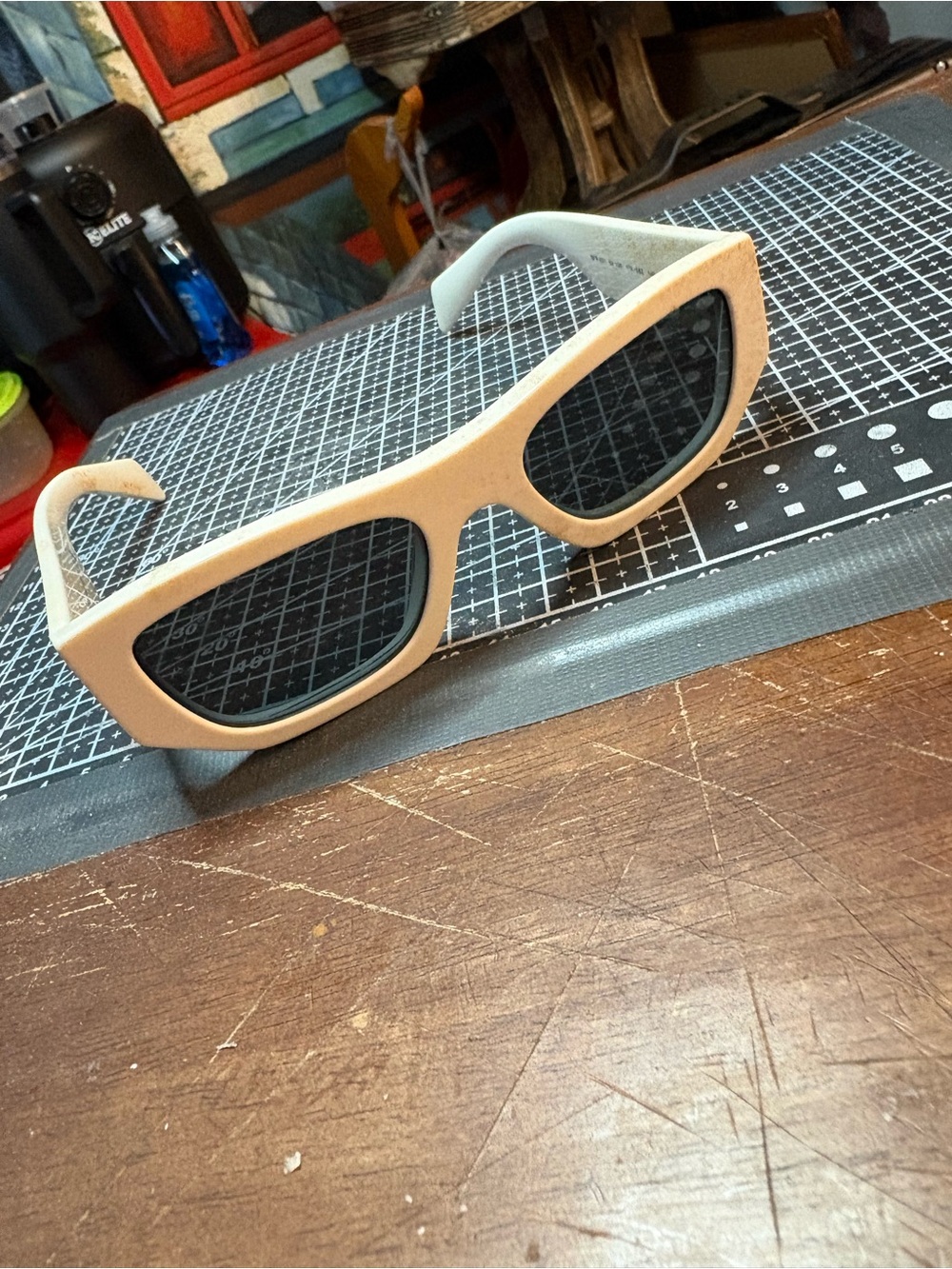Prada Cream Frame Sunglass-Style Protective Eyewear with Dark Lenses